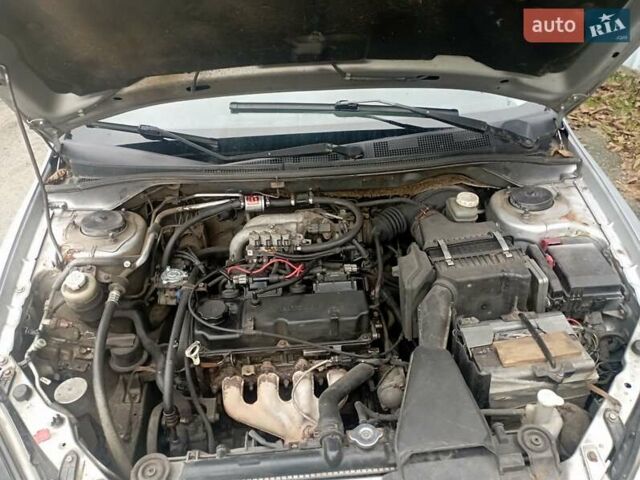 Серый Мицубиси Лансер, объемом двигателя 1.6 л и пробегом 350 тыс. км за 3000 $, фото 10 на Automoto.ua