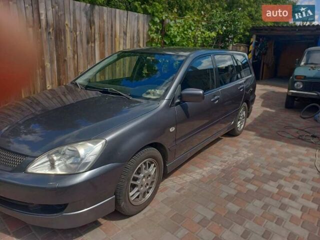 Сірий Міцубісі Lancer, об'ємом двигуна 1.6 л та пробігом 279 тис. км за 5800 $, фото 26 на Automoto.ua