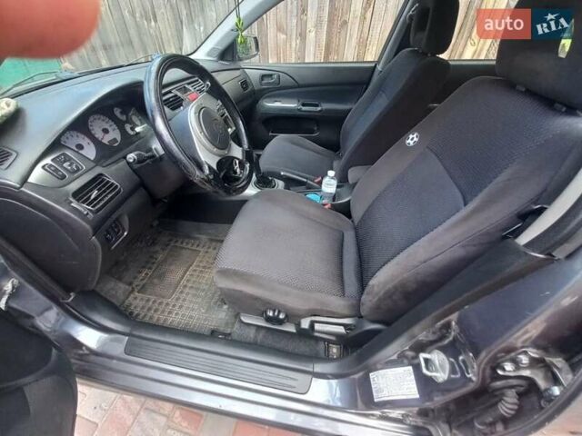 Сірий Міцубісі Lancer, об'ємом двигуна 1.6 л та пробігом 279 тис. км за 5800 $, фото 16 на Automoto.ua