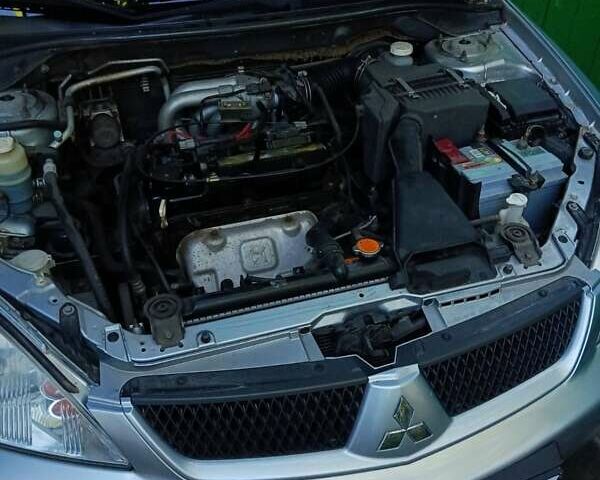 Сірий Міцубісі Lancer, об'ємом двигуна 1.6 л та пробігом 186 тис. км за 4200 $, фото 3 на Automoto.ua