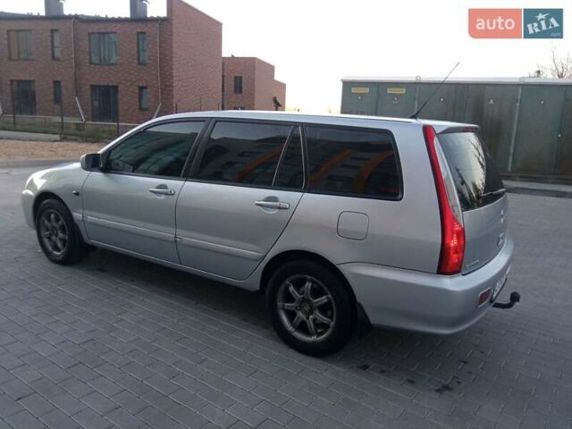 Сірий Міцубісі Lancer, об'ємом двигуна 1.58 л та пробігом 258 тис. км за 2999 $, фото 3 на Automoto.ua