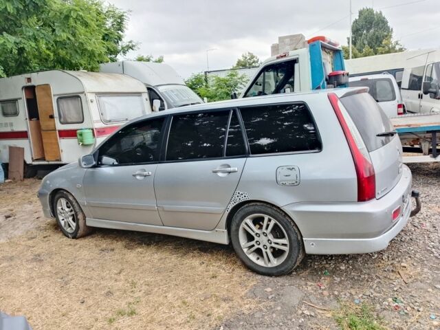 Серый Мицубиси Лансер, объемом двигателя 2 л и пробегом 3 тыс. км за 4520 $, фото 2 на Automoto.ua