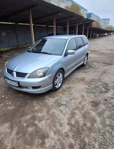 Серый Мицубиси Лансер, объемом двигателя 1.58 л и пробегом 223 тыс. км за 3200 $, фото 5 на Automoto.ua