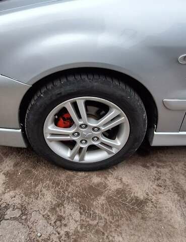 Серый Мицубиси Лансер, объемом двигателя 1.58 л и пробегом 223 тыс. км за 3200 $, фото 8 на Automoto.ua