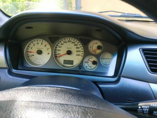 Серый Мицубиси Лансер, объемом двигателя 1.6 л и пробегом 178 тыс. км за 4000 $, фото 10 на Automoto.ua