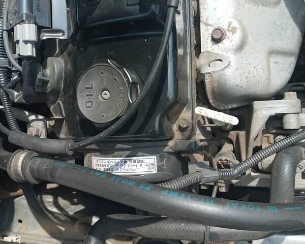 Сірий Міцубісі Lancer, об'ємом двигуна 1.6 л та пробігом 240 тис. км за 5000 $, фото 21 на Automoto.ua