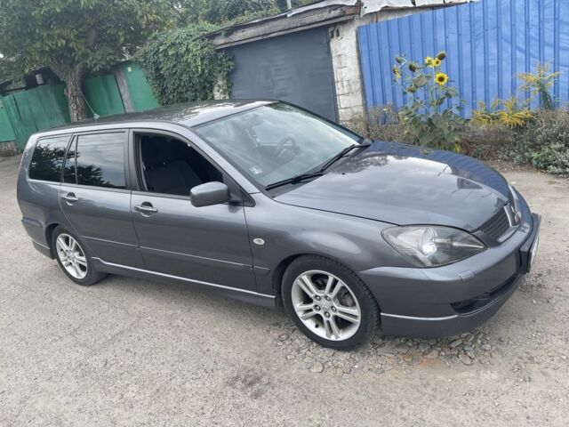 Сірий Міцубісі Lancer, об'ємом двигуна 2 л та пробігом 257 тис. км за 5000 $, фото 2 на Automoto.ua