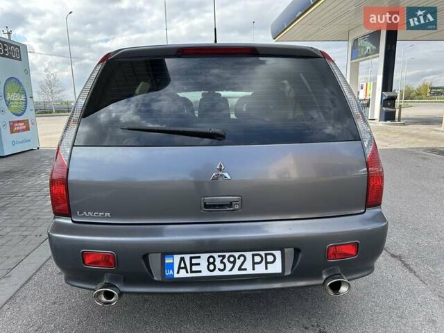 Сірий Міцубісі Lancer, об'ємом двигуна 1.59 л та пробігом 279 тис. км за 4999 $, фото 13 на Automoto.ua