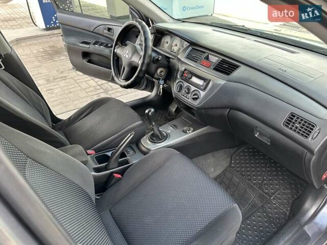 Сірий Міцубісі Lancer, об'ємом двигуна 1.59 л та пробігом 279 тис. км за 4999 $, фото 34 на Automoto.ua