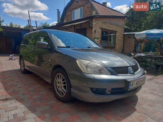 Сірий Міцубісі Lancer, об'ємом двигуна 1.6 л та пробігом 279 тис. км за 5800 $, фото 25 на Automoto.ua