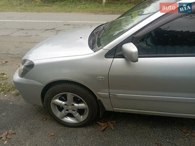 Серый Мицубиси Лансер, объемом двигателя 1.6 л и пробегом 350 тыс. км за 3000 $, фото 9 на Automoto.ua