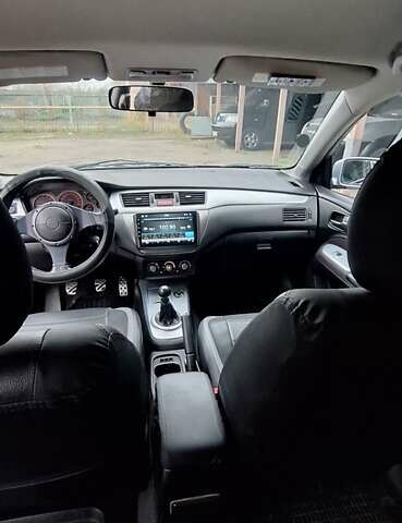 Серый Мицубиси Лансер, объемом двигателя 1.58 л и пробегом 223 тыс. км за 3200 $, фото 12 на Automoto.ua