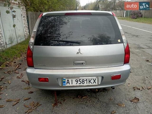 Серый Мицубиси Лансер, объемом двигателя 1.6 л и пробегом 350 тыс. км за 3000 $, фото 6 на Automoto.ua