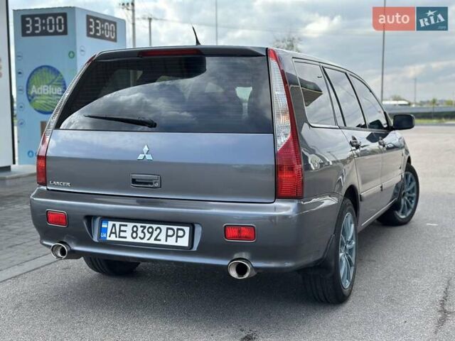 Сірий Міцубісі Lancer, об'ємом двигуна 1.59 л та пробігом 279 тис. км за 4999 $, фото 1 на Automoto.ua