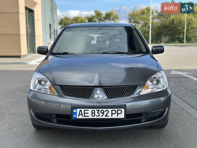 Сірий Міцубісі Lancer, об'ємом двигуна 1.59 л та пробігом 279 тис. км за 4999 $, фото 8 на Automoto.ua
