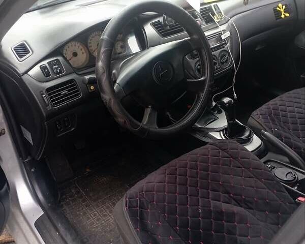 Серый Мицубиси Лансер, объемом двигателя 1.6 л и пробегом 350 тыс. км за 3000 $, фото 4 на Automoto.ua