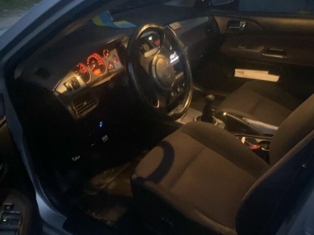 Серый Мицубиси Лансер, объемом двигателя 2 л и пробегом 250 тыс. км за 4058 $, фото 5 на Automoto.ua