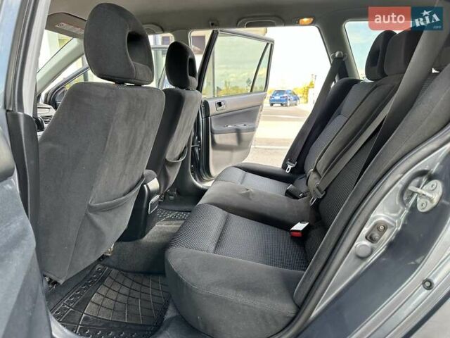 Сірий Міцубісі Lancer, об'ємом двигуна 1.59 л та пробігом 279 тис. км за 4999 $, фото 30 на Automoto.ua