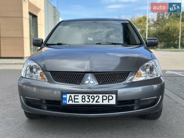 Сірий Міцубісі Lancer, об'ємом двигуна 1.59 л та пробігом 279 тис. км за 4999 $, фото 5 на Automoto.ua
