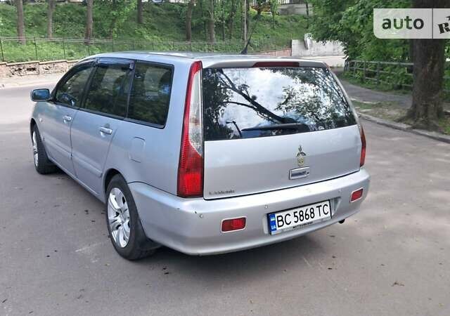 Сірий Міцубісі Lancer, об'ємом двигуна 1.6 л та пробігом 244 тис. км за 4200 $, фото 6 на Automoto.ua