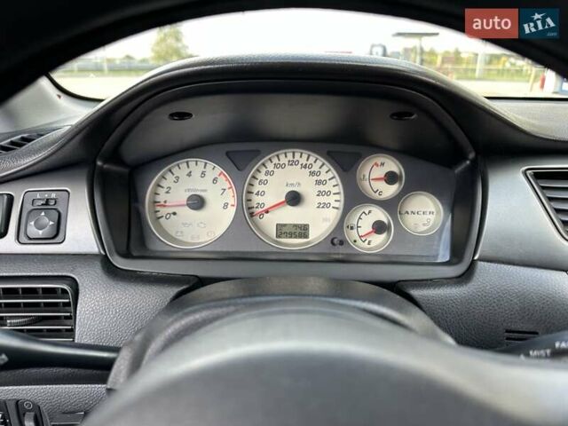 Сірий Міцубісі Lancer, об'ємом двигуна 1.59 л та пробігом 279 тис. км за 4999 $, фото 25 на Automoto.ua