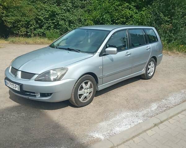 Сірий Міцубісі Lancer, об'ємом двигуна 1.6 л та пробігом 240 тис. км за 5000 $, фото 9 на Automoto.ua