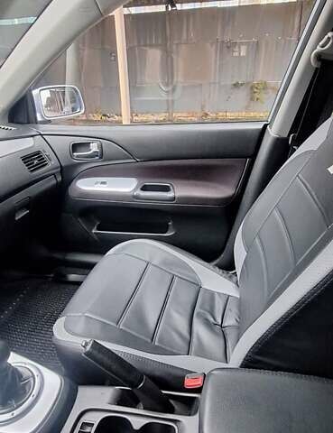 Серый Мицубиси Лансер, объемом двигателя 1.58 л и пробегом 223 тыс. км за 3200 $, фото 10 на Automoto.ua