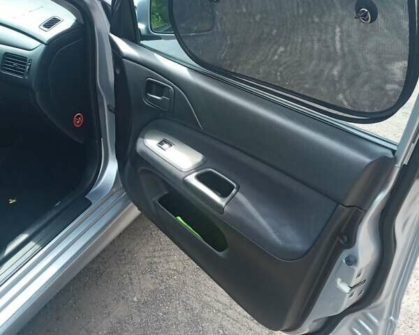 Сірий Міцубісі Lancer, об'ємом двигуна 1.6 л та пробігом 240 тис. км за 5000 $, фото 17 на Automoto.ua