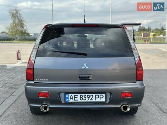 Сірий Міцубісі Lancer, об'ємом двигуна 1.59 л та пробігом 279 тис. км за 4999 $, фото 18 на Automoto.ua