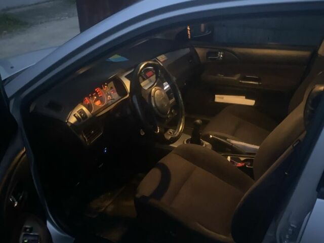 Серый Мицубиси Лансер, объемом двигателя 2 л и пробегом 250 тыс. км за 4058 $, фото 4 на Automoto.ua