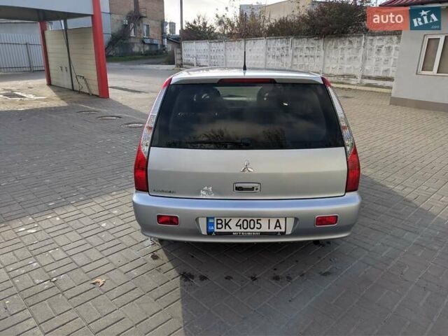 Сірий Міцубісі Lancer, об'ємом двигуна 1.58 л та пробігом 220 тис. км за 4499 $, фото 22 на Automoto.ua