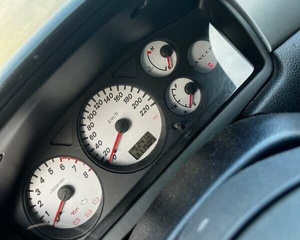 Сірий Міцубісі Lancer, об'ємом двигуна 1.6 л та пробігом 311 тис. км за 3800 $, фото 10 на Automoto.ua