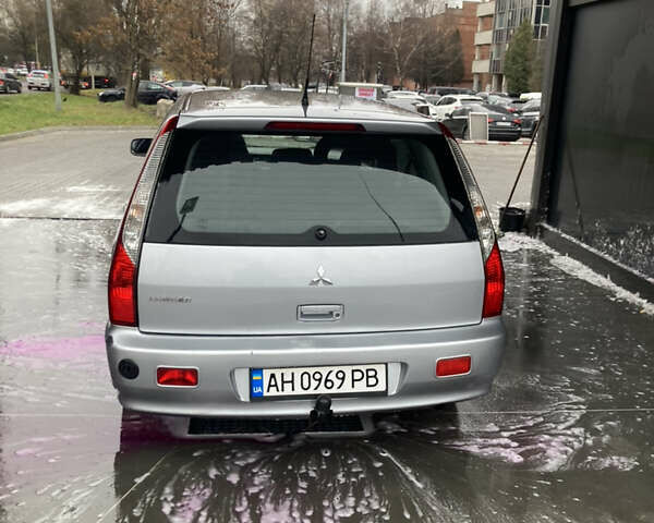 Сірий Міцубісі Lancer, об'ємом двигуна 1.58 л та пробігом 247 тис. км за 4350 $, фото 1 на Automoto.ua