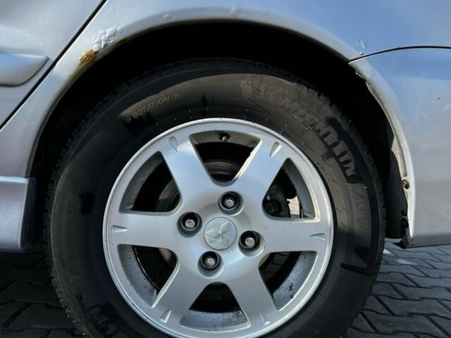 Сірий Міцубісі Lancer, об'ємом двигуна 1.6 л та пробігом 311 тис. км за 3800 $, фото 2 на Automoto.ua