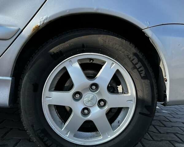 Сірий Міцубісі Lancer, об'ємом двигуна 1.6 л та пробігом 311 тис. км за 3800 $, фото 1 на Automoto.ua
