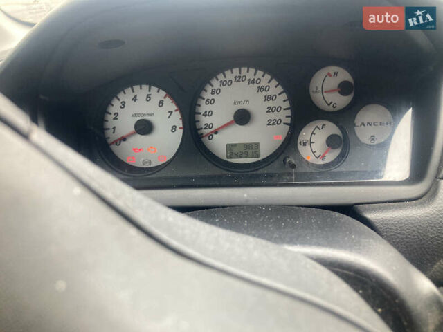 Сірий Міцубісі Lancer, об'ємом двигуна 1.58 л та пробігом 247 тис. км за 4350 $, фото 6 на Automoto.ua