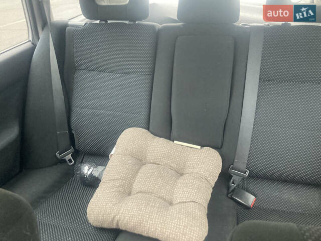 Сірий Міцубісі Lancer, об'ємом двигуна 1.58 л та пробігом 247 тис. км за 4350 $, фото 7 на Automoto.ua