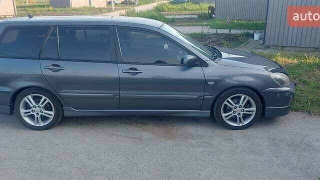 Сірий Міцубісі Lancer, об'ємом двигуна 2 л та пробігом 200 тис. км за 4000 $, фото 7 на Automoto.ua
