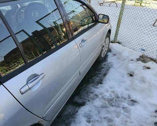 Серый Мицубиси Лансер, объемом двигателя 1.6 л и пробегом 198 тыс. км за 4100 $, фото 8 на Automoto.ua