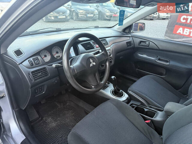 Серый Мицубиси Лансер, объемом двигателя 1.6 л и пробегом 278 тыс. км за 3900 $, фото 11 на Automoto.ua