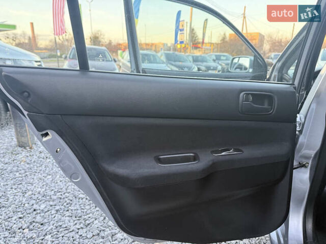 Серый Мицубиси Лансер, объемом двигателя 1.6 л и пробегом 278 тыс. км за 3900 $, фото 9 на Automoto.ua