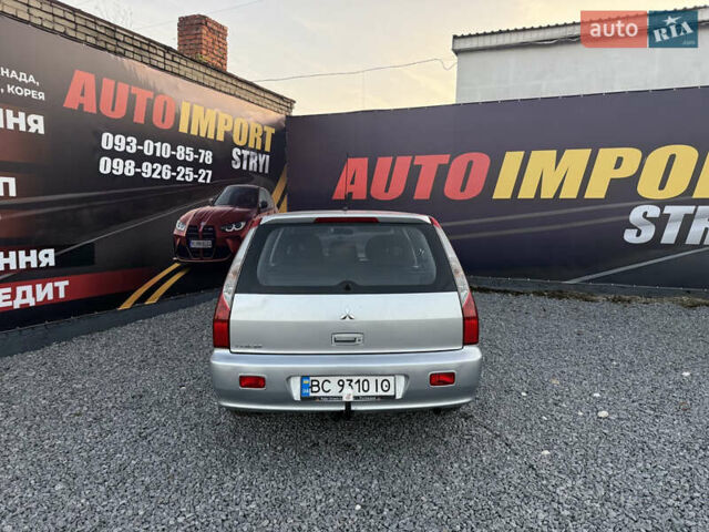 Серый Мицубиси Лансер, объемом двигателя 1.6 л и пробегом 278 тыс. км за 3900 $, фото 4 на Automoto.ua