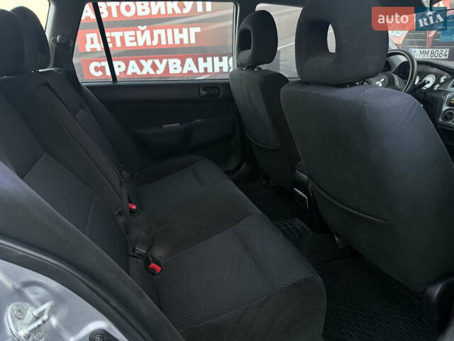 Серый Мицубиси Лансер, объемом двигателя 1.6 л и пробегом 278 тыс. км за 3900 $, фото 8 на Automoto.ua
