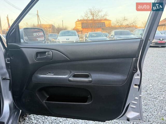 Серый Мицубиси Лансер, объемом двигателя 1.6 л и пробегом 278 тыс. км за 3900 $, фото 6 на Automoto.ua