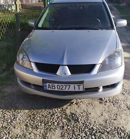 Сірий Міцубісі Lancer, об'ємом двигуна 1.6 л та пробігом 200 тис. км за 4700 $, фото 7 на Automoto.ua
