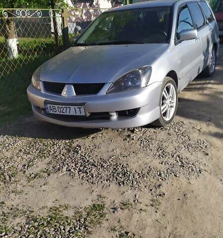 Сірий Міцубісі Lancer, об'ємом двигуна 1.6 л та пробігом 200 тис. км за 4700 $, фото 8 на Automoto.ua