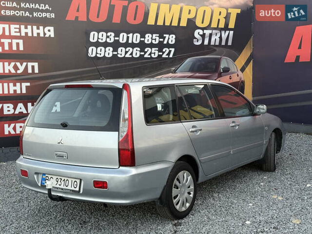 Серый Мицубиси Лансер, объемом двигателя 1.6 л и пробегом 278 тыс. км за 3900 $, фото 2 на Automoto.ua