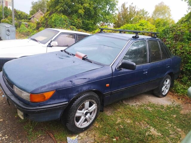 Синий Мицубиси Лансер, объемом двигателя 1.8 л и пробегом 263 тыс. км за 1600 $, фото 1 на Automoto.ua