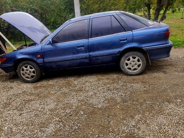 Синій Міцубісі Lancer, об'ємом двигуна 1.5 л та пробігом 460 тис. км за 900 $, фото 2 на Automoto.ua