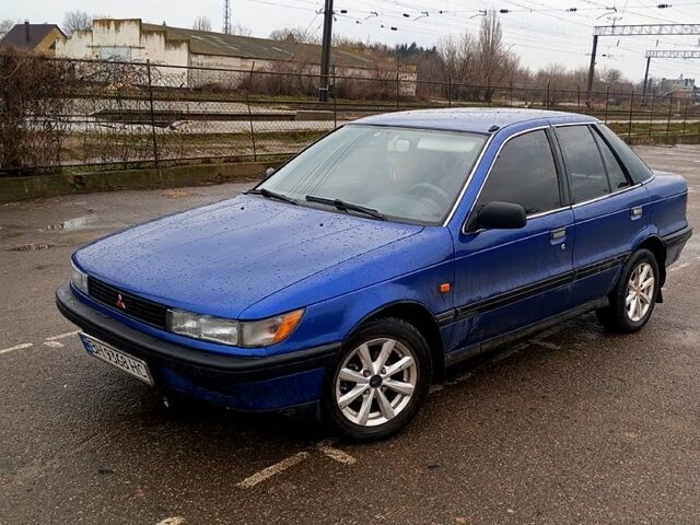 Синій Міцубісі Lancer, об'ємом двигуна 1.5 л та пробігом 255 тис. км за 2100 $, фото 4 на Automoto.ua